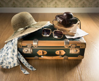 Vintage suitcase and traveling gear